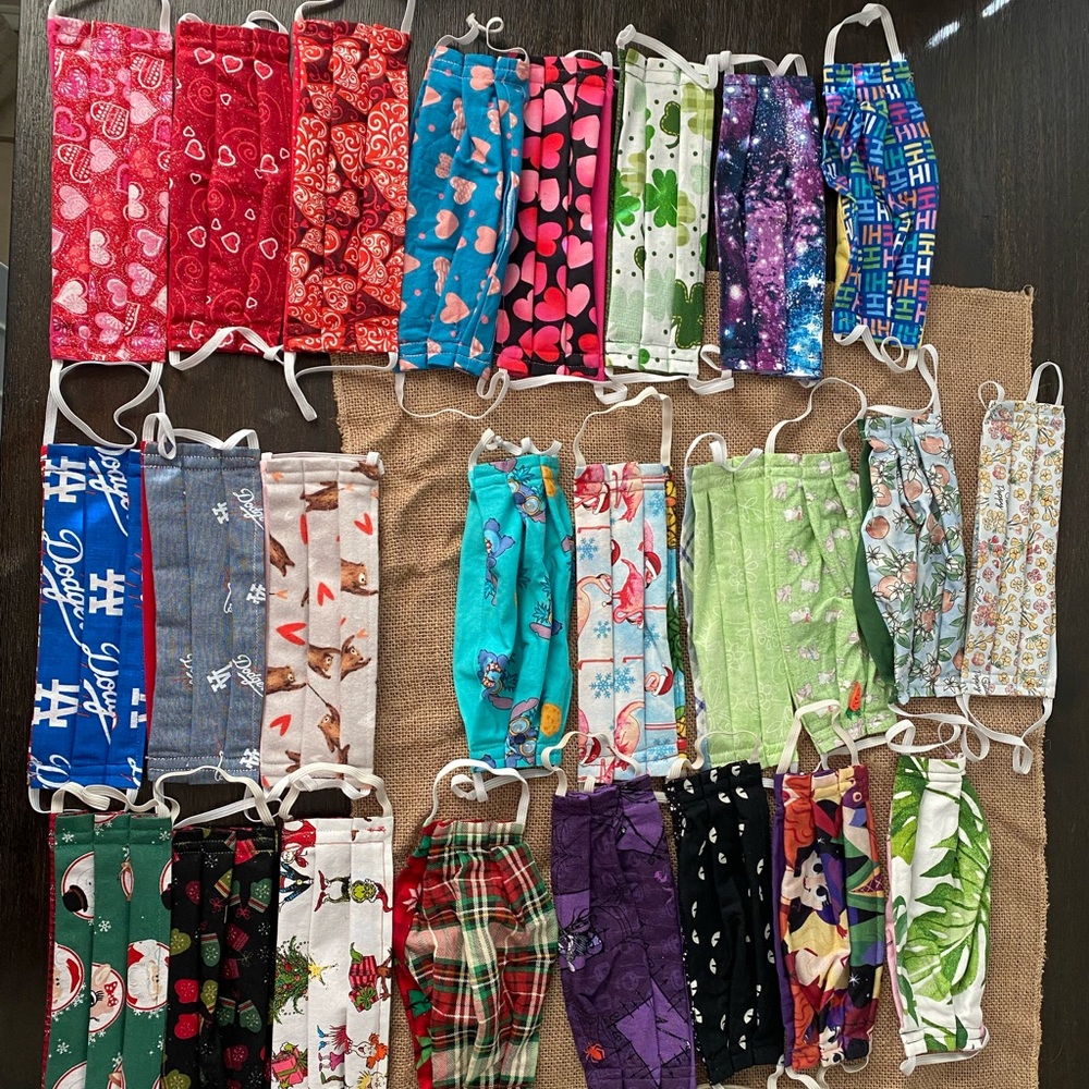 Face masks. 25 masks Used once and washed. Different patterns on both sides.